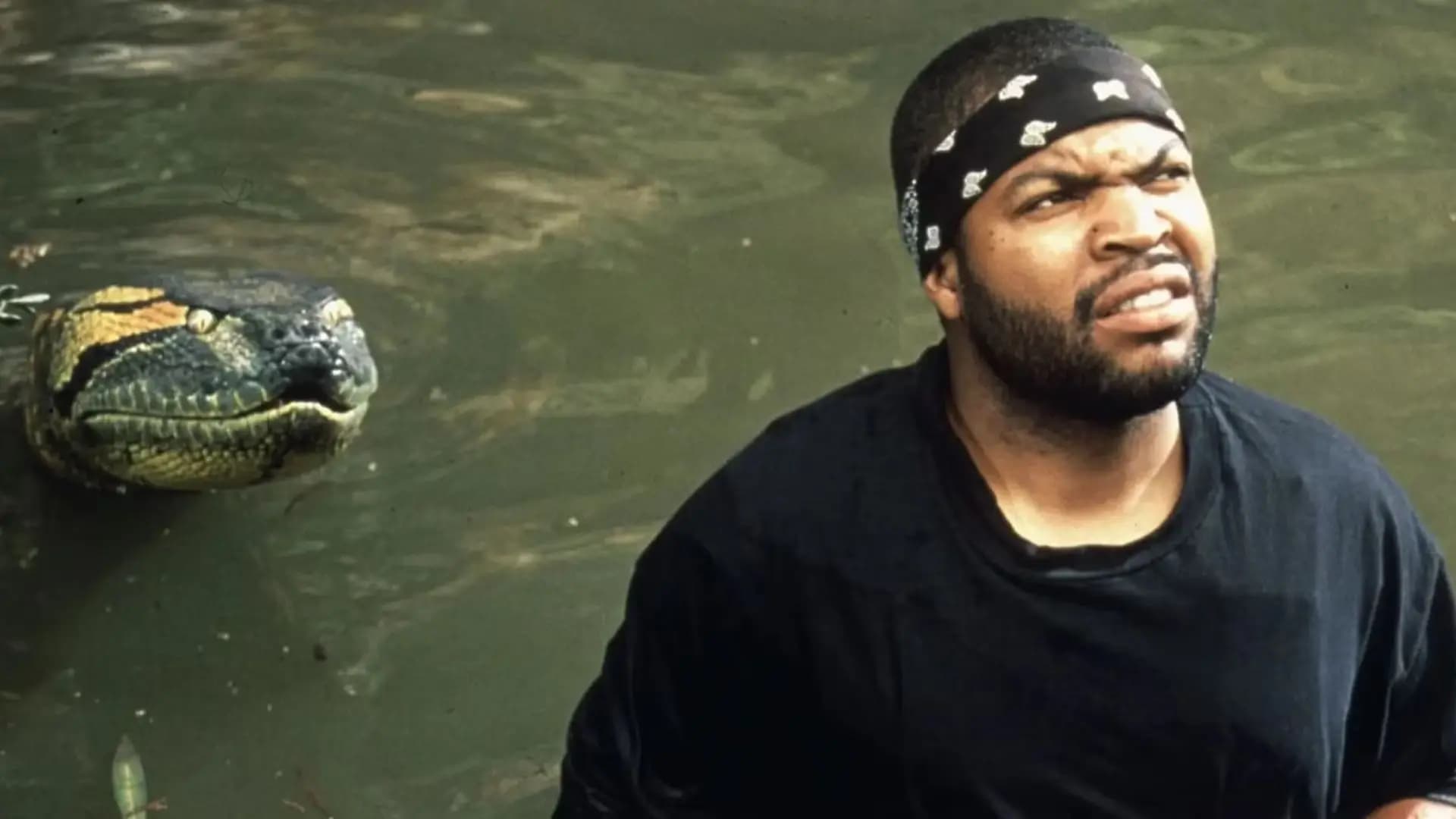 A massive anaconda looms behind Ice Cube’s character in the 1997 creature feature Anaconda