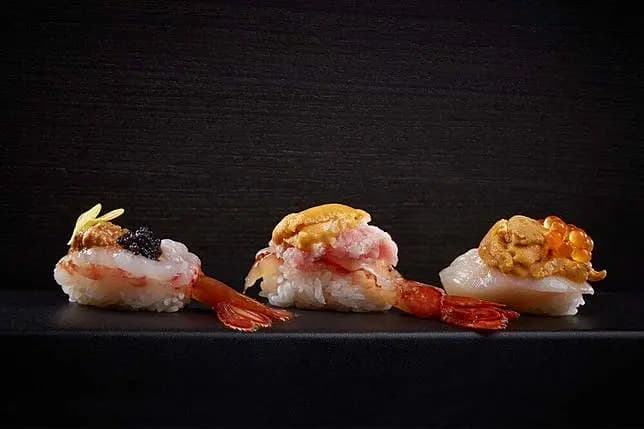 Yu-Sanmi Mori creative sushi trio with scallop, sea urchin, and shrimp stacks