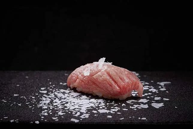 Kami Omakase 11-Course Set featuring 7 pieces of sushi and appetizers