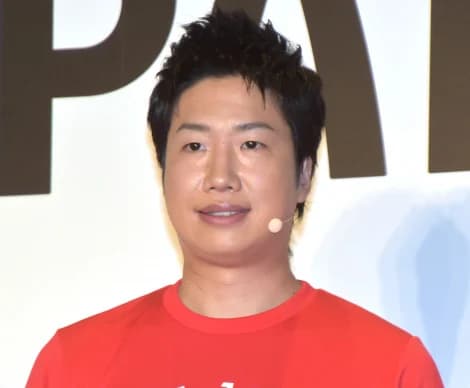 水谷隼露面，报道其奥运冠军身份与投资爆亏话题的配图