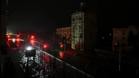 Wide view of darkened urban areas in Zaporizhzhia following Russian attacks that cut power to nearly all of southeastern Ukraine