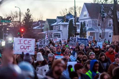 Community members gathering to protest ICE at a vigil for Renee Good, highlighting anger over the agency's use of force