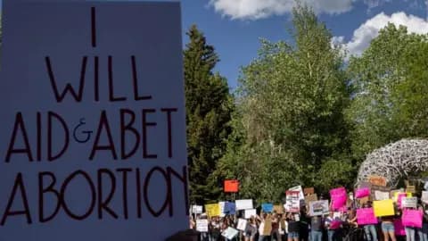 Wide shot of abortion rights demonstrators in Jackson Hole, Wyoming after Roe v Wade reversal